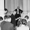 Geograaf Frans Snacken speecht in 1967 tijdens de inhuldiging van de nieuwe huisvesting van het Seminarie voor Regionale Aardrijkskunde in de Coupure 273, met geoloog Armand Hacquaert centraal op de achtergrond (foto uit privé