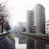 Zicht op de Schelde achter de Sint-Pietersnieuwstraat met de oude en de nieuwe vleugel van het rectoraat en het Technicum (Collectie Universiteitsarchief Gent).