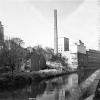 Zicht op Technicum en Blandijnberg vanop de Muinkkaai. Links de huizenrij waar in 1978 campus Hoveniersberg gebouwd zal worden (Collectie Universiteitsarchief Gent).