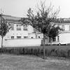 Het Anatomisch Instituut aan de Bijloke. Rechts de boog van het auditorium uit 1878 en links de latere aanbouw (Collectie Universiteitsarchief Gent).